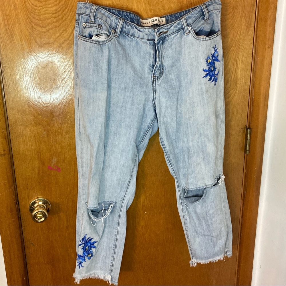 Light wash jeans with flower patches Ashley Mason